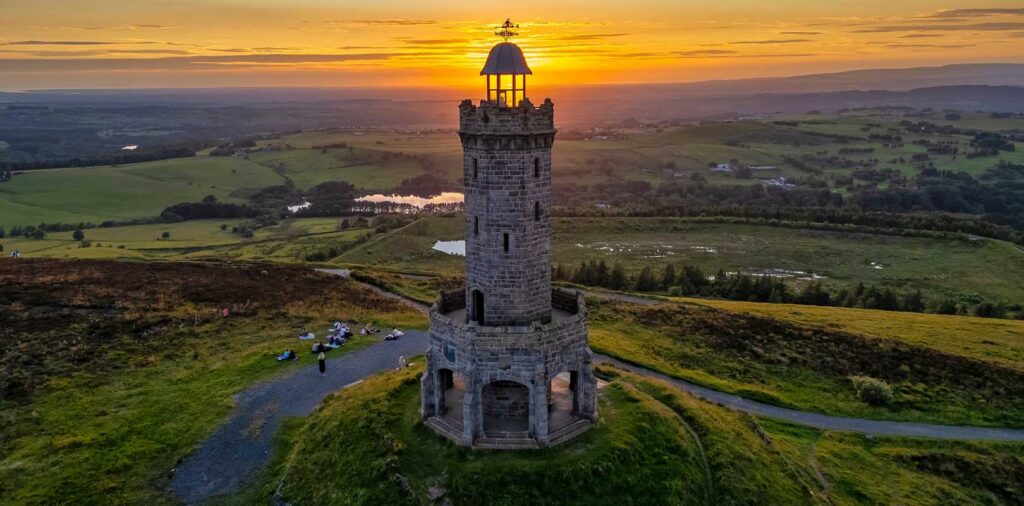 Darwen Tower, also known as Jubilee Tower, an octagonal stone structure located on Darwen Hill in Lancashire, England.